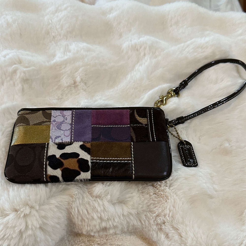 Coach Wristlet purse. 7x4 inches